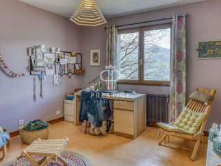 Discover a charming property with a cozy study area.