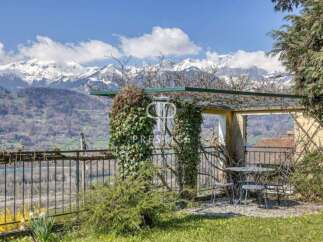 Experience breathtaking mountain views from this stunning property.