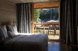 Experience the charm of this cozy bedroom with a stunning view.