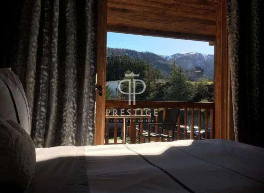 Experience breathtaking mountain views from this luxurious property.
