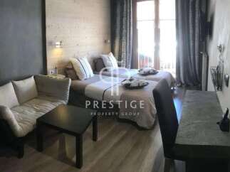 Discover a cozy retreat in this stylish bedroom.