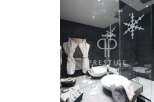 Indulge in luxury at this stunning property, featuring a modern bathroom design.