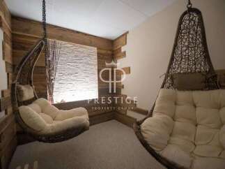 Relax in style with these unique hanging chairs, perfect for unwinding after a long day.