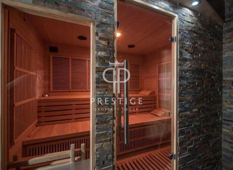 Indulge in ultimate relaxation within this luxurious sauna.