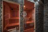 Indulge in ultimate relaxation within this luxurious sauna.