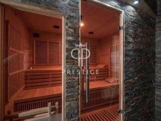 Indulge in ultimate relaxation within this luxurious sauna.