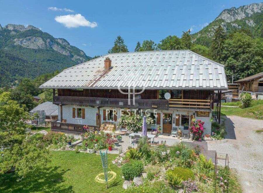 Discover a stunning property nestled in a picturesque mountain setting.