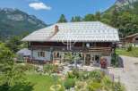 Discover a stunning property nestled in a picturesque mountain setting.