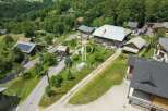 Discover a stunning property nestled in a picturesque mountain setting.