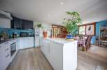 Discover a stunning kitchen with modern appliances and ample storage.