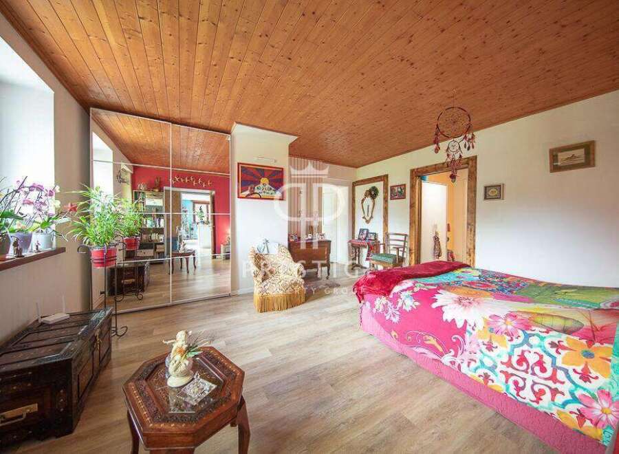 Discover a charming bedroom with a unique blend of rustic and bohemian styles.