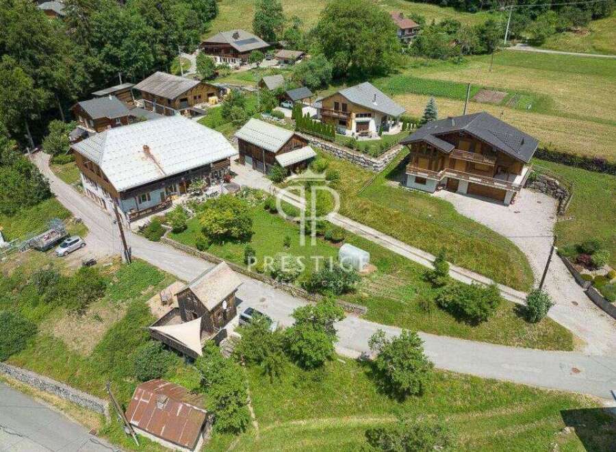 Discover a charming village nestled in a picturesque landscape, featuring stunning homes with unique architectural designs.