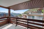 Enjoy breathtaking mountain views from this stunning balcony.