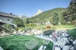 Escape to a stunning mountain retreat with breathtaking views.