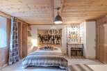 Experience rustic charm in this cozy bedroom.
