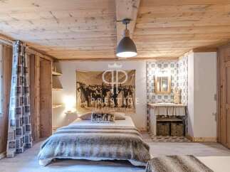 Experience rustic charm in this cozy bedroom.