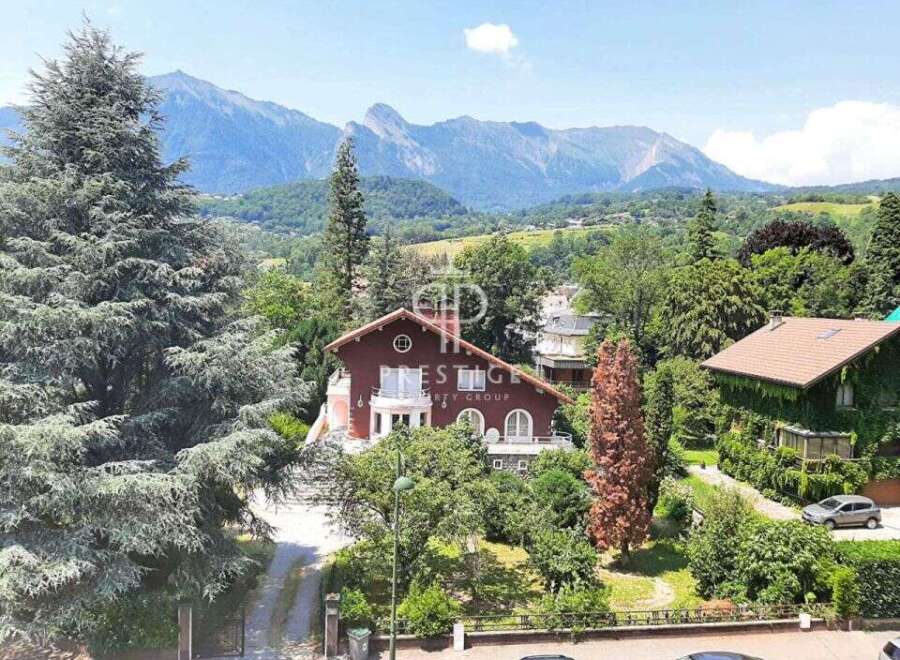 Discover a stunning property nestled amidst breathtaking mountain views.