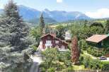Discover a stunning property nestled amidst breathtaking mountain views.