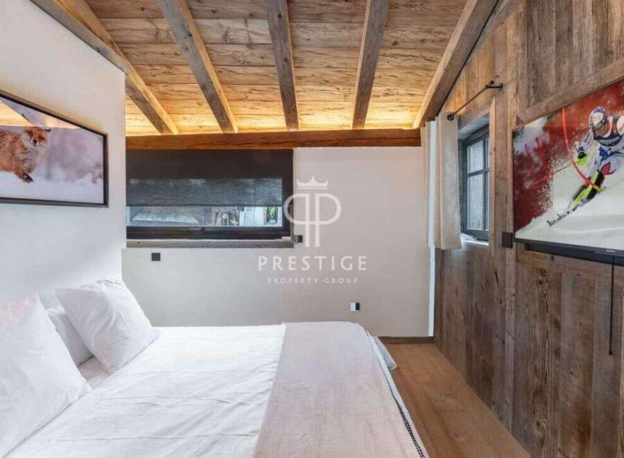 Experience rustic elegance in this stunning bedroom.