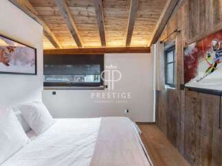 Experience rustic elegance in this stunning bedroom.