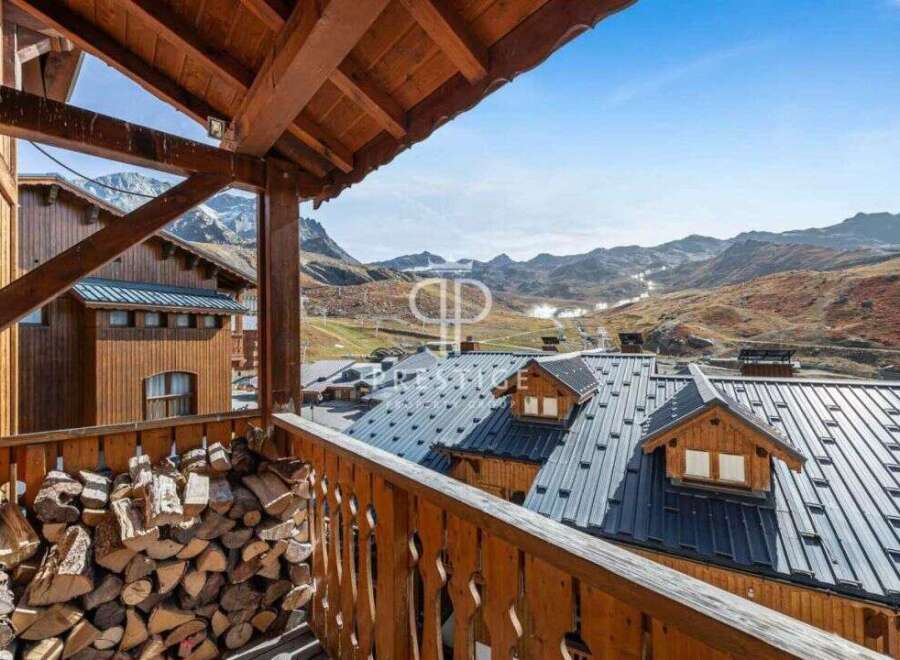 Enjoy breathtaking mountain views from this charming chalet.