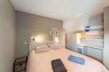 Discover a cozy bedroom with a modern design.
