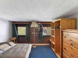Discover a cozy bedroom with a rustic charm.
