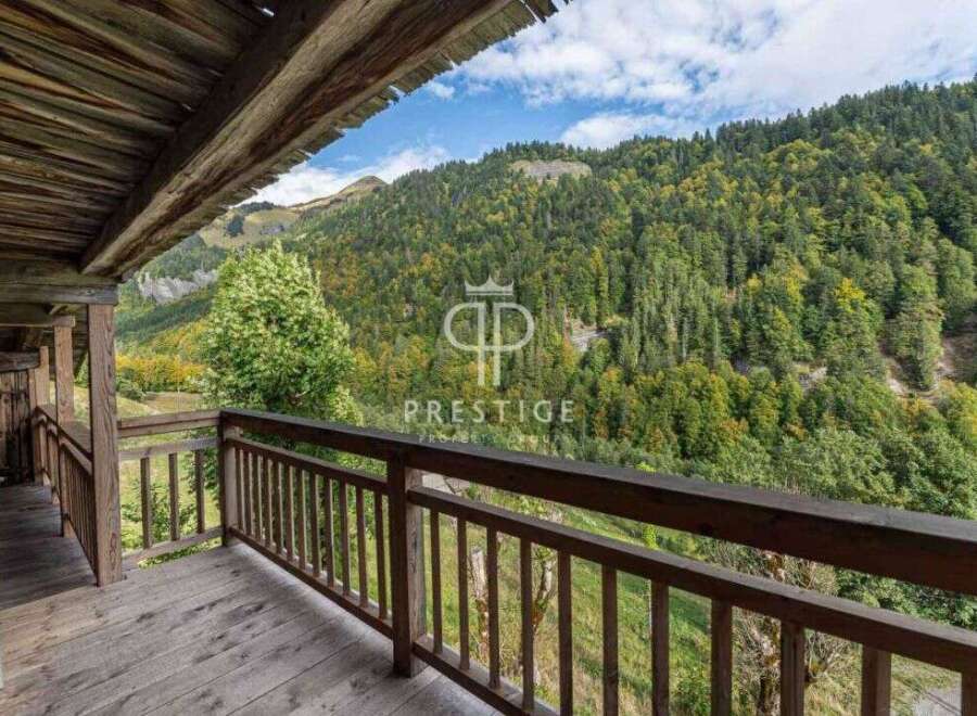 Experience breathtaking mountain views from this charming chalet.