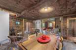 Discover rustic charm in this stunning property, featuring exposed wooden beams and walls that exude warmth.