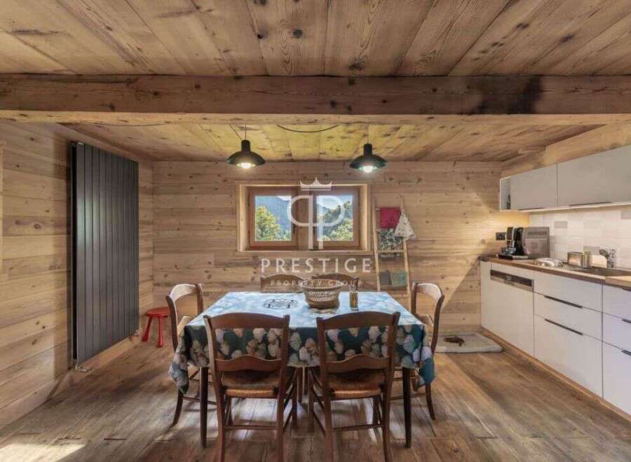 Experience rustic charm in this stunning property, featuring beautiful wooden interiors and a cozy atmosphere.