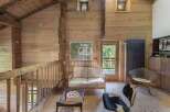Discover the charm of this stunning wooden cabin, perfect for a cozy retreat.
