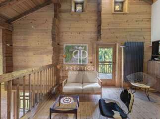 Discover the charm of this stunning wooden cabin, perfect for a cozy retreat.