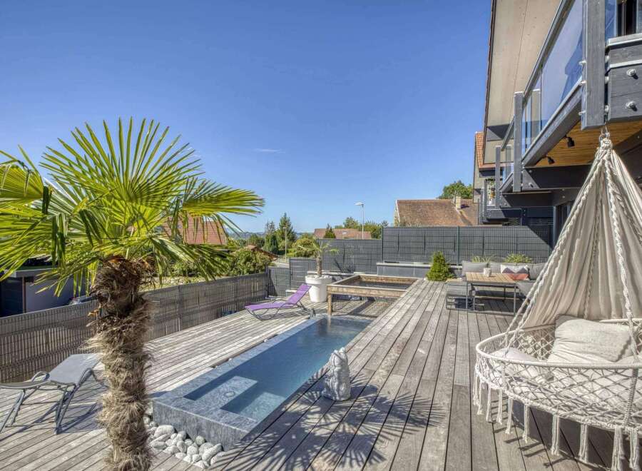 Luxury modern home with a stunning outdoor oasis.