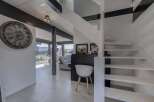 Stunning modern home boasts an open-concept floor plan with sleek, contemporary finishes.
