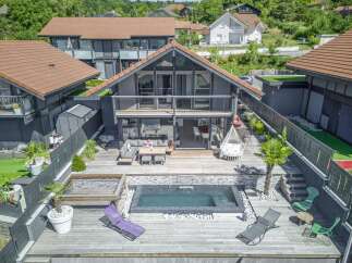 Stunning contemporary home with a private pool and expansive deck.