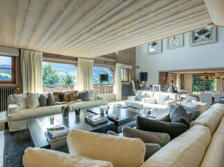 Luxurious chalet with stunning mountain views and spacious living area.