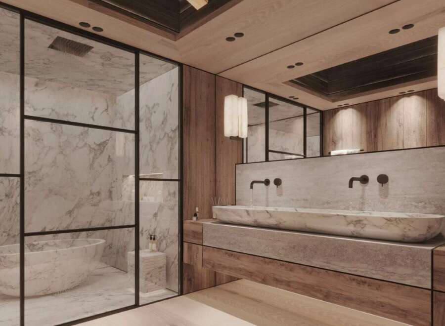Luxurious bathroom with marble finishes and wooden accents.