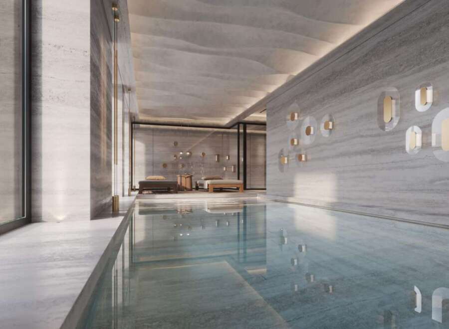 Indulge in luxury with this stunning indoor pool, featuring sleek design and serene ambiance.