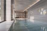Indulge in luxury with this stunning indoor pool, featuring sleek design and serene ambiance.