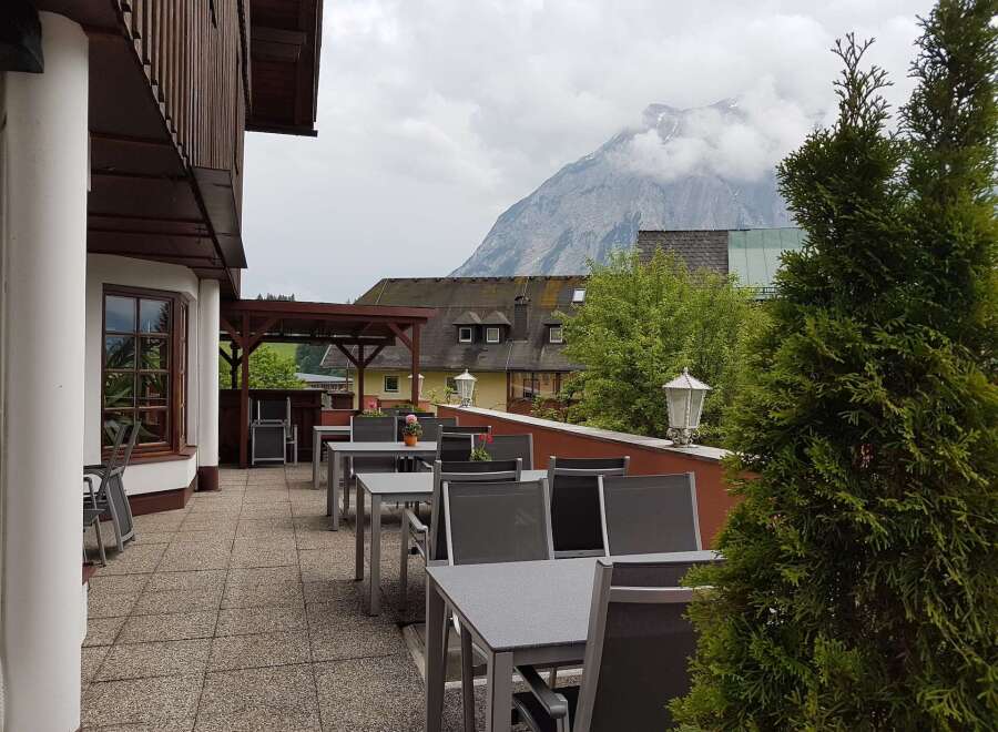Enjoy breathtaking mountain views from the outdoor terrace of this charming property.