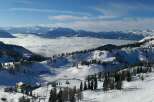 Experience the breathtaking beauty of a snow-covered mountain landscape.