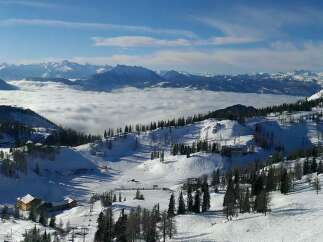 Experience the breathtaking beauty of a snow-covered mountain landscape.