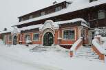 Experience a cozy stay at this charming hotel, perfect for a winter getaway.