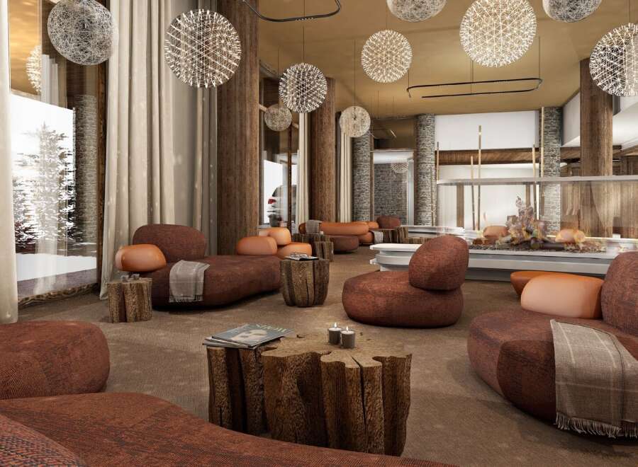 Experience ultimate relaxation in this luxurious lounge, featuring plush seating and a cozy fireplace.