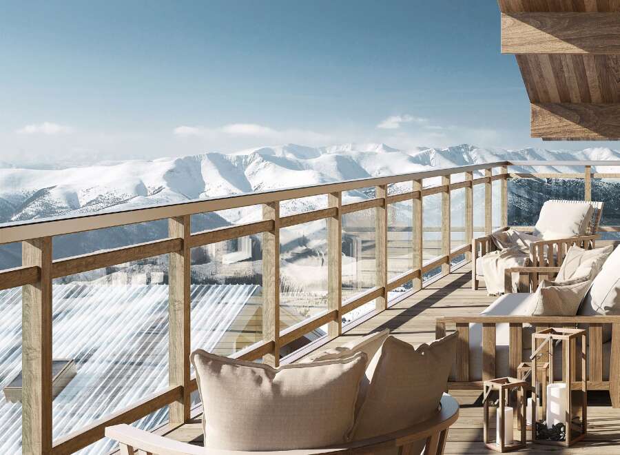 Enjoy breathtaking mountain views from this luxurious balcony.
