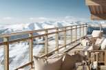 Enjoy breathtaking mountain views from this luxurious balcony.