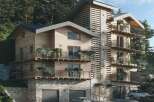 Luxury mountain chalet with stunning views and private balconies.