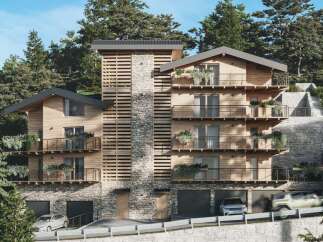 Luxury mountain chalet with stunning views and private balconies.