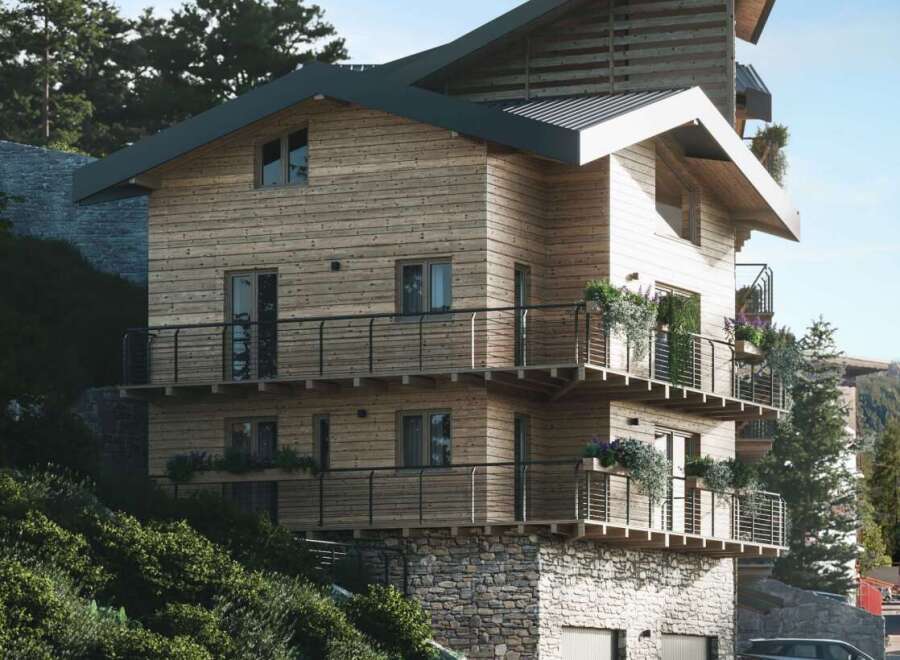 This stunning mountain home boasts a unique architectural design, blending modern and rustic elements.