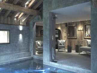 Indulge in luxury with this stunning indoor pool, nestled within a unique chalet-style property.